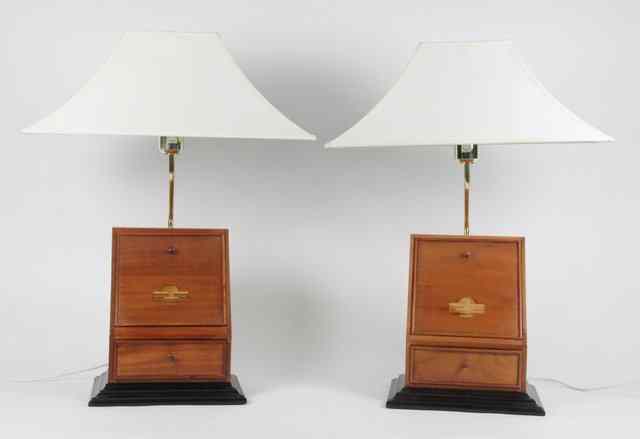 Appraisal: A pair of modern bedside lamps the wooden bases each