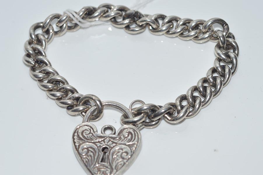 Appraisal: A STERLING SILVER PADLOCK BRACELET A STERLING SILVER PADLOCK BRACELET