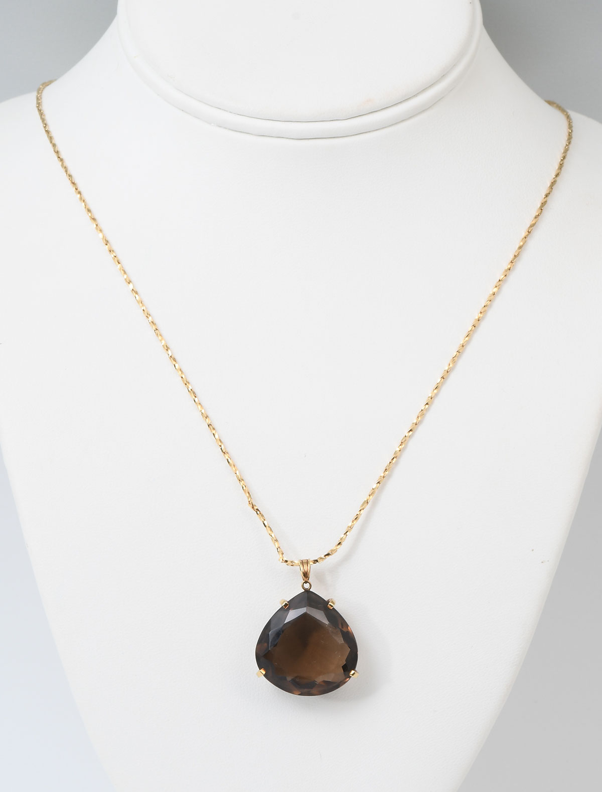 Appraisal: K SMOKY QUARTZ PENDANT CHAIN K yellow gold pendant contains