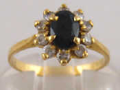 Appraisal: A yellow metal tests carat gold sapphire and diamond cluster