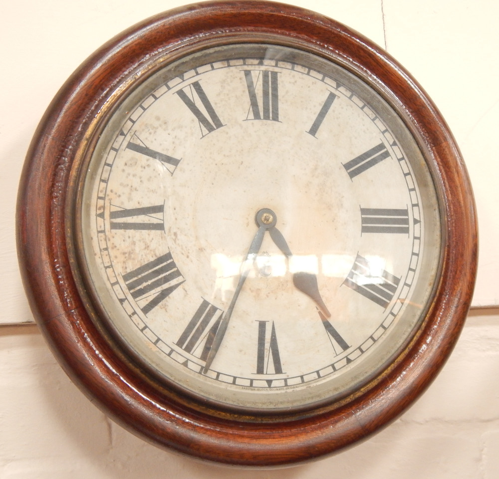 Appraisal: A late thC oak cased circular Ansonia wall clock with