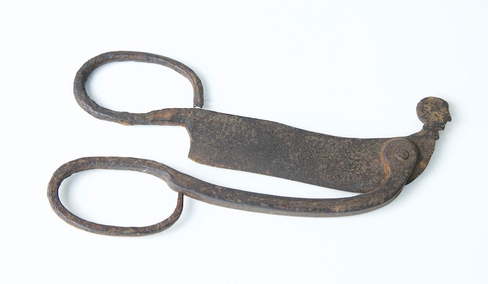 Appraisal: Pair of Unusual Cast Iron Scissors with Portrait of Gentleman