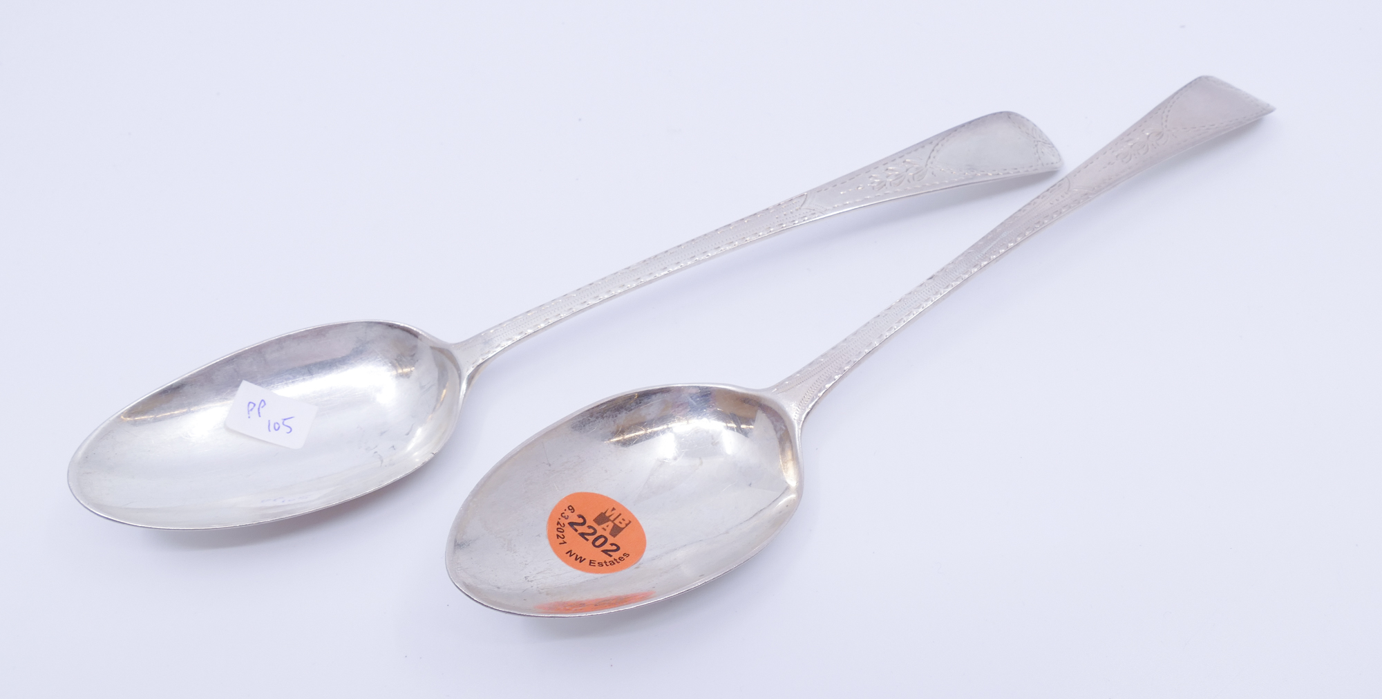 Appraisal: Pair Georgian Silver Engraved Spoons- ''- g TW