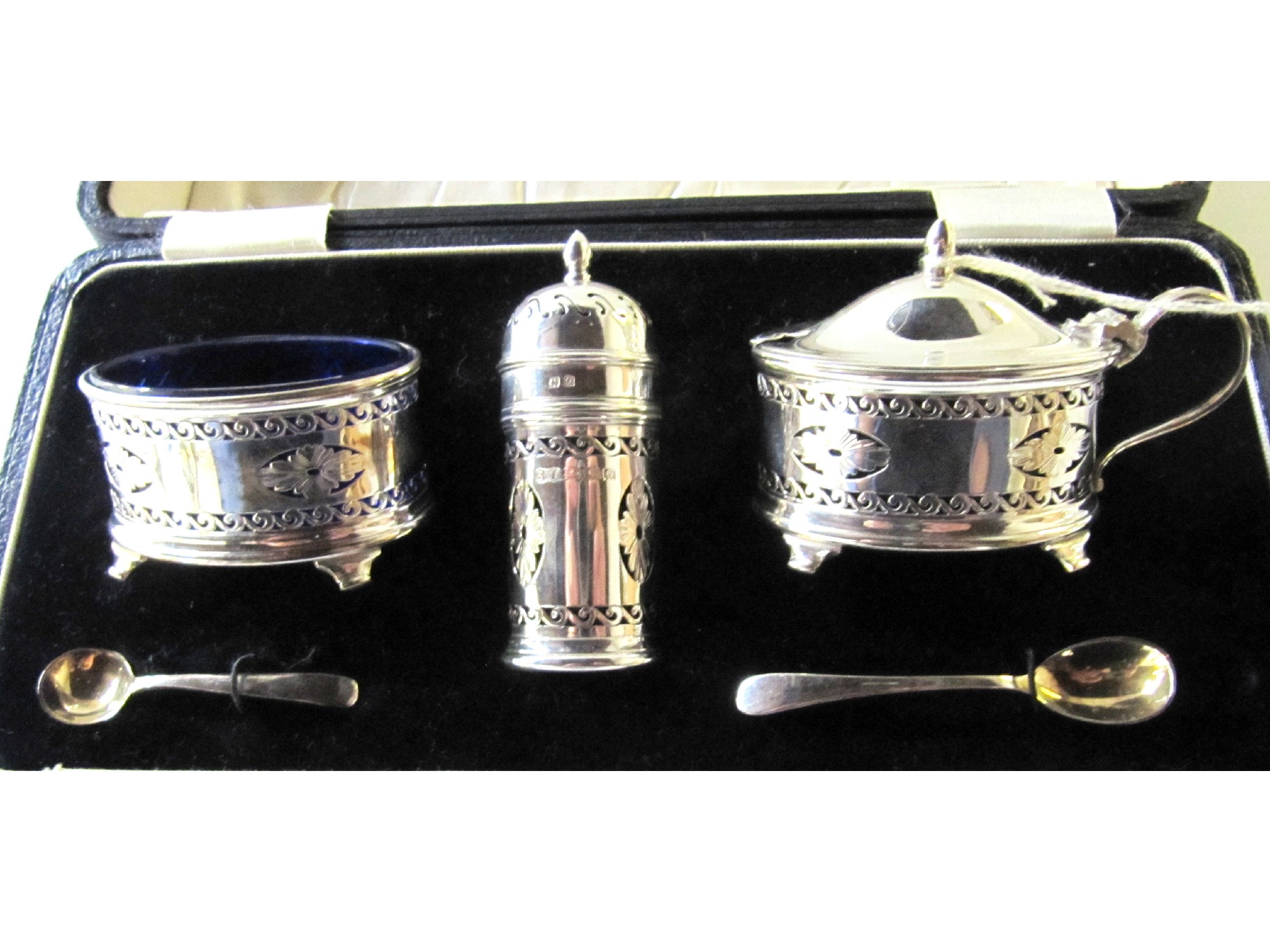 Appraisal: A cased three piece silver condiment set Birmingham