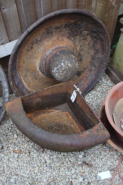 Appraisal: AN OLD CAST IRON CORNER WATER TROUGH cm wide together