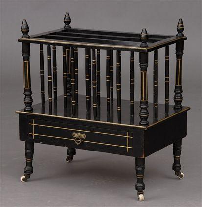 Appraisal: AESTHETIC MOVEMENT EBONIZED AND GILT-INCISED CANTERBURY The spindle gallery enclosing