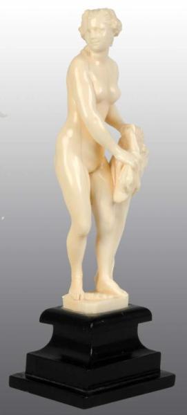 Appraisal: Ivory Statue of Nude Lady Holding Lion's Head Description No