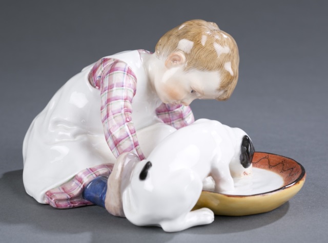 Appraisal: Meissen Porcelain Figure Konrad Hentschel Boy sitting with dog and