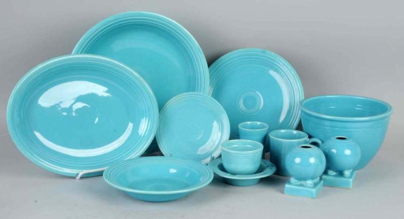 Appraisal: Lot of Turquoise Colored Fiestaware Description Includes four candleholders one