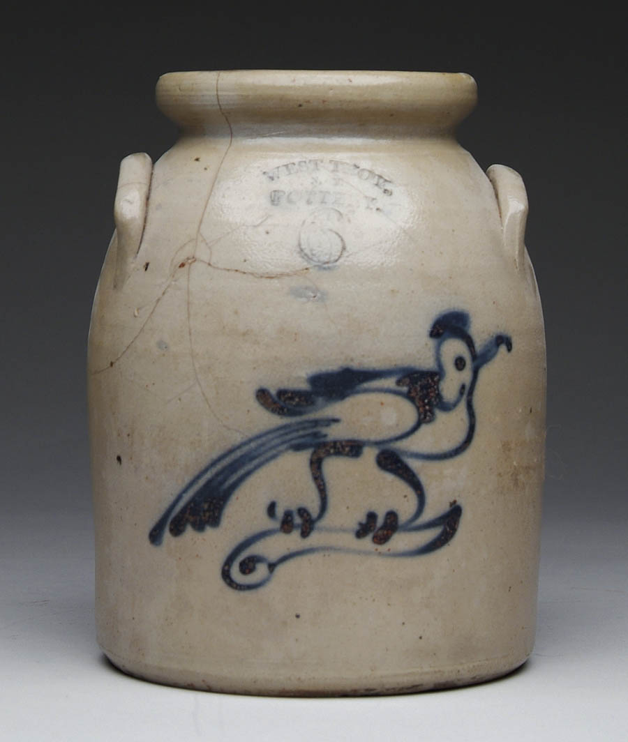 Appraisal: TWO HANDLED BIRD STONEWARE CROCK Bird facing right with impressed