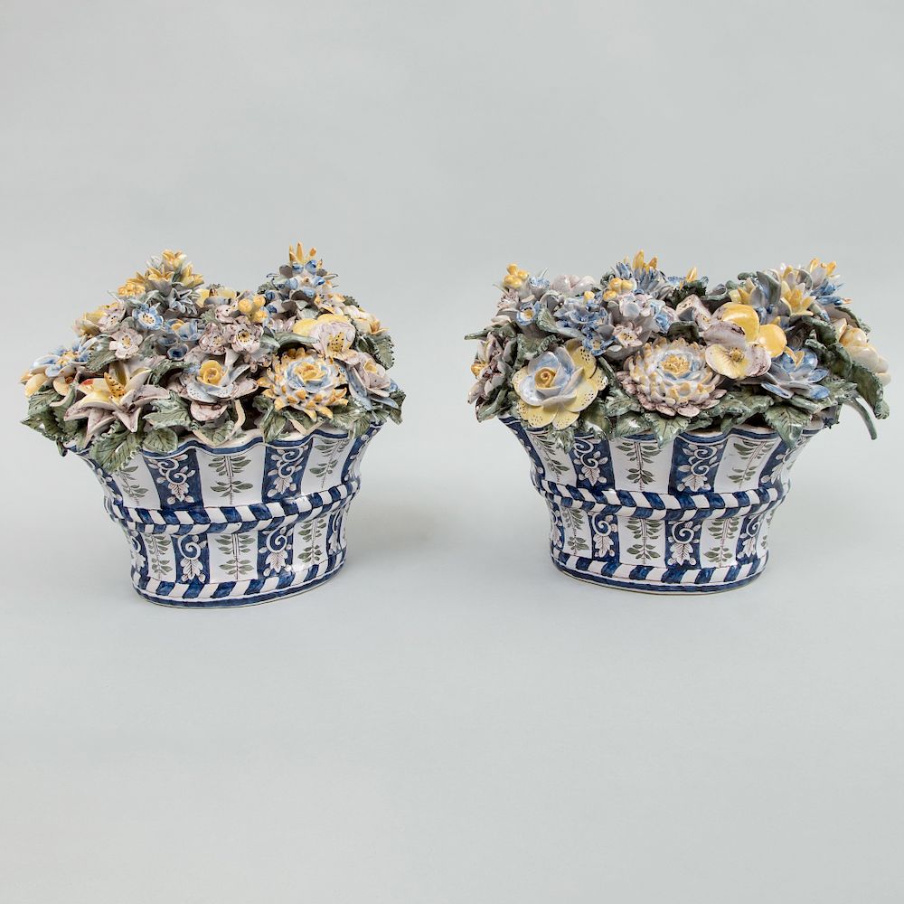 Appraisal: Pair of Continental Faience Demilune Baskets of Flowers Marked in