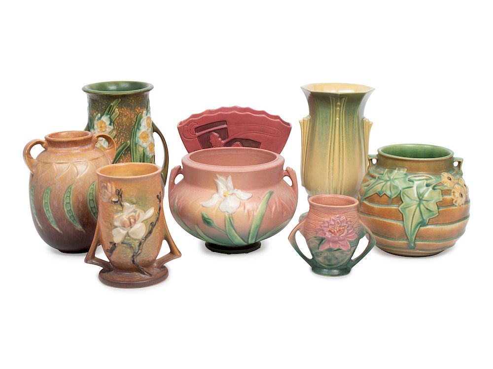 Appraisal: A Group of Eight Roseville Pottery Vases Height of tallest