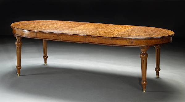 Appraisal: A Victorian yew and walnut extension dining table third quarter