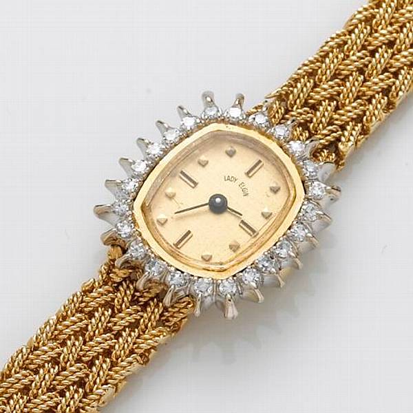 Appraisal: A ladies diamond and k gold watch Elgin gross weight