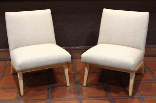 Appraisal: Pair of Moderne blondewood slipper chairs Pair of Moderne blondewood