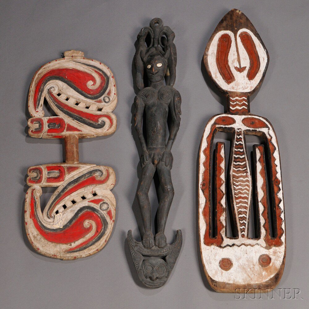 Appraisal: Three Melanesian Wood Carvings a Sepik River male hook figure