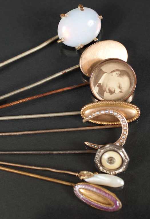 Appraisal: Assorted Victorian gilt metal enamel moonstone pearl etc stickpins Estimate