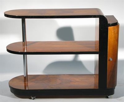 Appraisal: An Art Deco walnut veneer drinks serving trolley the top