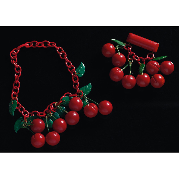 Appraisal: Bakelite cherries necklace and pin necklace having eight marbled red