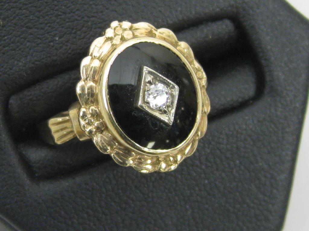 Appraisal: A Diamond and Enamel Mourning Ring the circular-cut stone pav