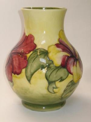 Appraisal: A MOORCROFT POTTERY VASE of bellied form tube lined in