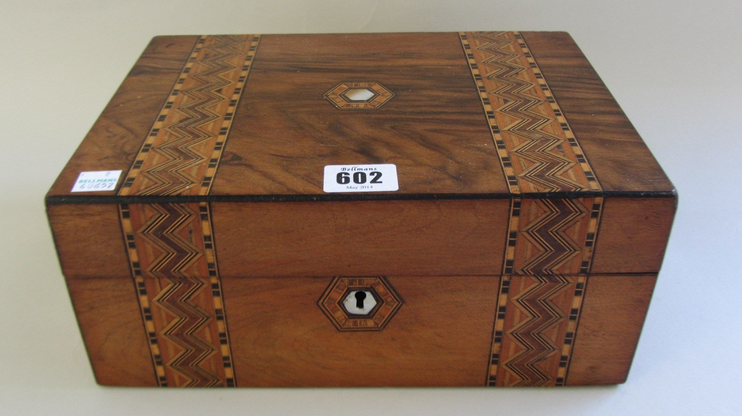 Appraisal: A Victorian marquetry inlaid walnut sewing box with fitted interior