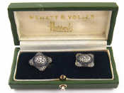 Appraisal: A pair of diamond and sapphire cufflinks with gilt metal