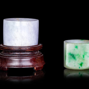 Appraisal: Two Chinese Jadeite Archer's Rings TH TH CENTURY comprising a