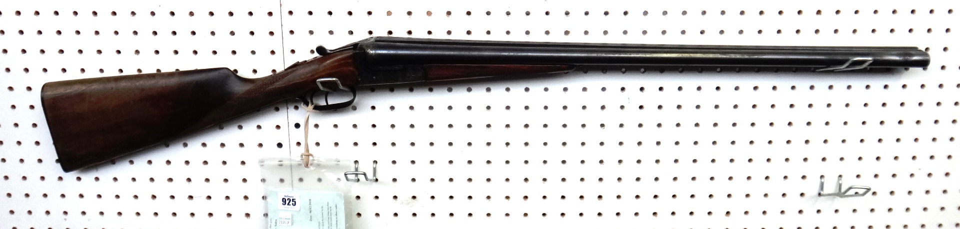 Appraisal: A twelve bore Spanish 'Astra' shotgun with plain steel barrels