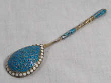 Appraisal: A Russian silver gilt tea spoon with turquoise and white