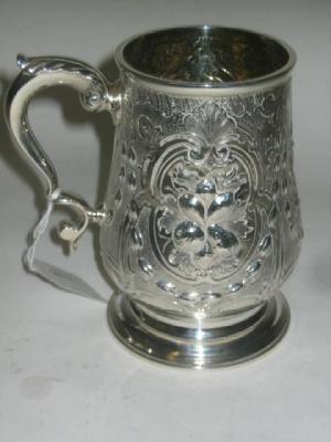 Appraisal: A GEORGE III BALUSTER TANKARD Chas Wright London with acanthus