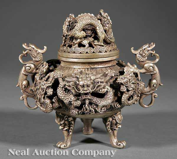 Appraisal: A Chinese Bronze Tripod Censer the squat globular body raised