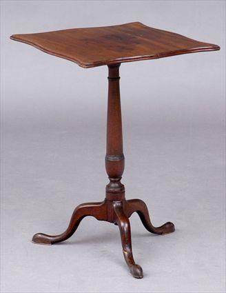 Appraisal: NEW ENGLAND CANDLESTAND The serpentine shaped top above a turned