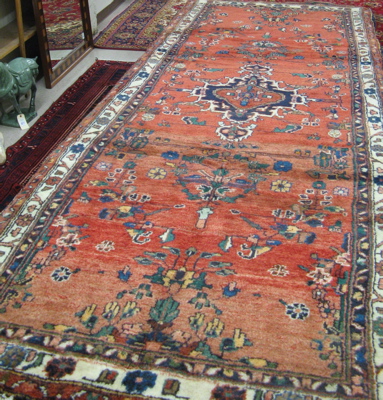 Appraisal: PERSIAN TRIBAL RUNNER northwest Iran central medallion and scattered floral