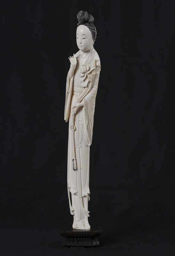 Appraisal: CHINESE CARVED IVORY FIGURAL WOMAN Figure of a woman in