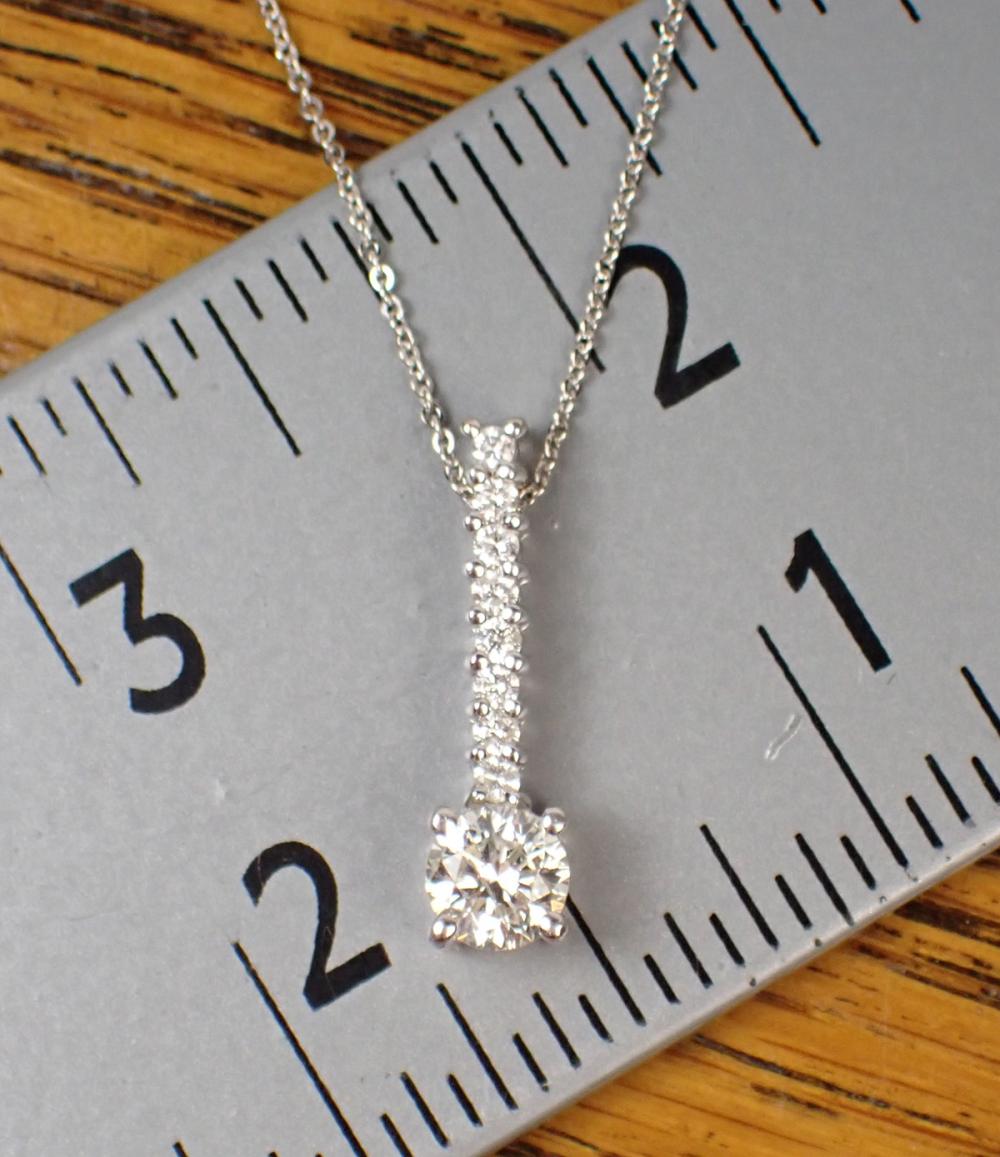 Appraisal: DIAMOND AND FOURTEEN KARAT WHITE GOLD PENDANT NECKLACE the vertical