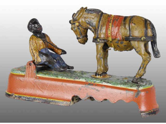 Appraisal: Cast Iron Spise a Mule Mechanical Bank Description -A Red