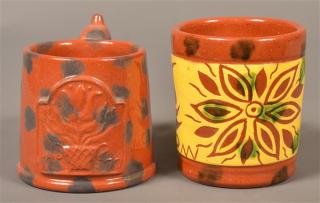 Appraisal: Two James Seagreaves Pottery Mugs One with Sgrafitto Decoration -