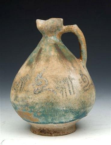 Appraisal: A KASHAN BLUE LUSTRE EWER decorated with a band of