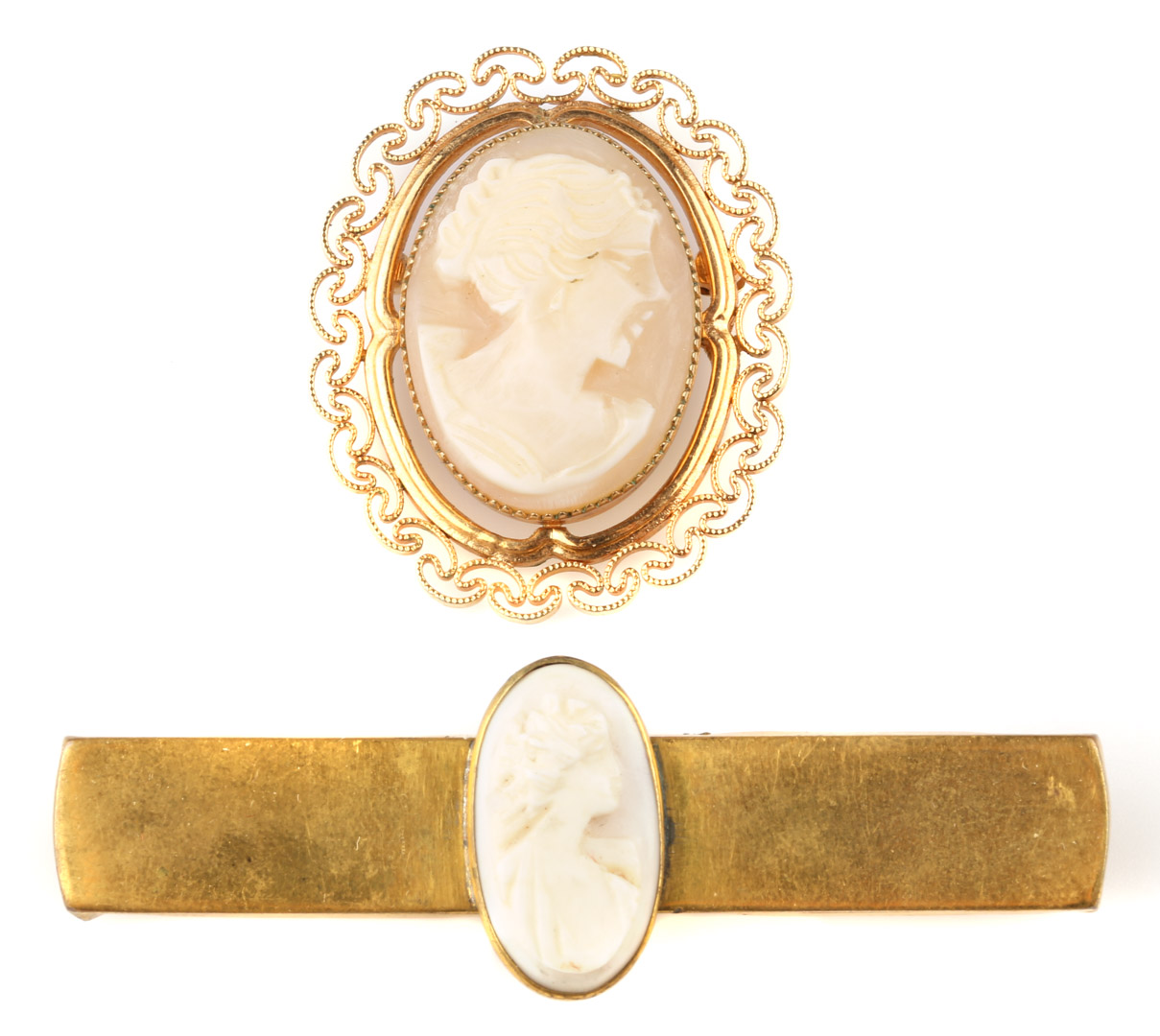 Appraisal: Two Gold Cameo Pins Carved profiles oval with filigree setting