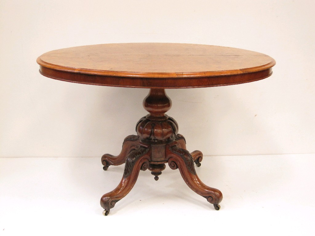 Appraisal: A Victorian walnut Loo Table having moulded oval top on