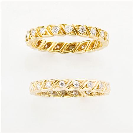 Appraisal: Pair of Gold and Diamond Band Rings Estimate -