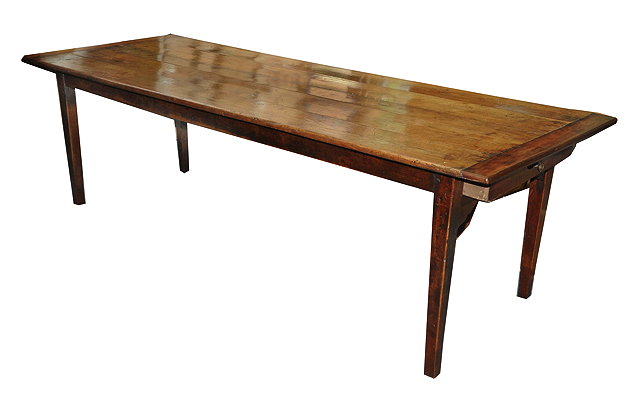 Appraisal: A FRENCH FARMHOUSE KITCHEN TABLE the planked top with cleated