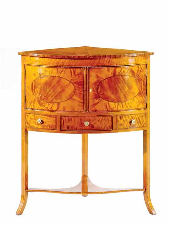 Appraisal: George III inlaid mahogany corner stand circa fan-inlaid bowed top