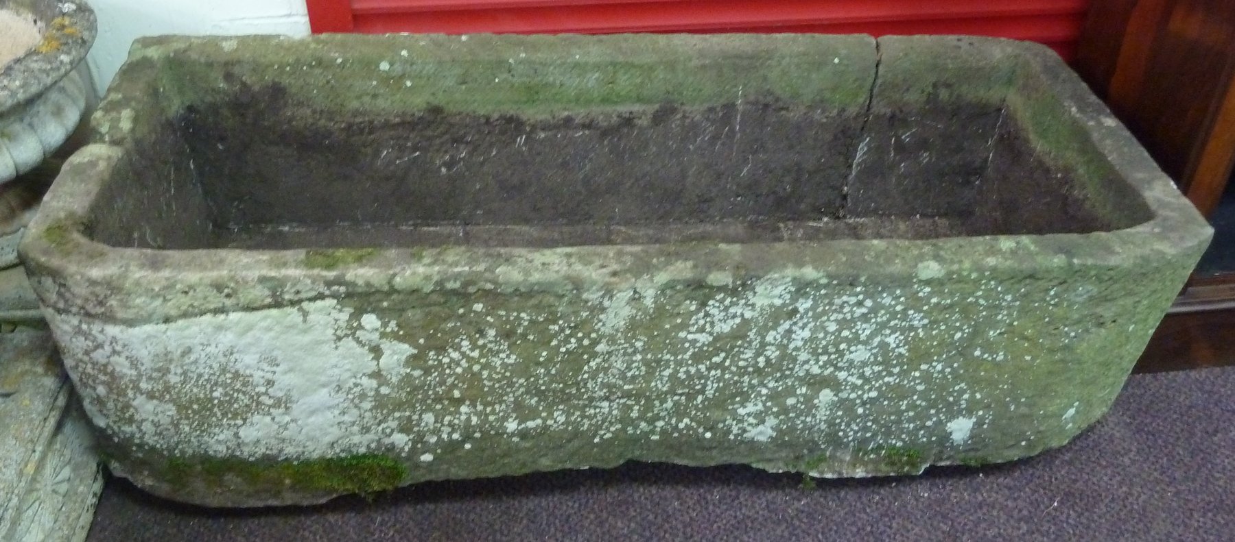 Appraisal: A large rectangular stone trough with rounded front corners cm