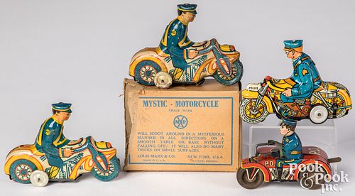 Appraisal: FOUR MARX LITHOGRAPHED TIN WIND-UP POLICE CYCLESFour Marx lithographed tin