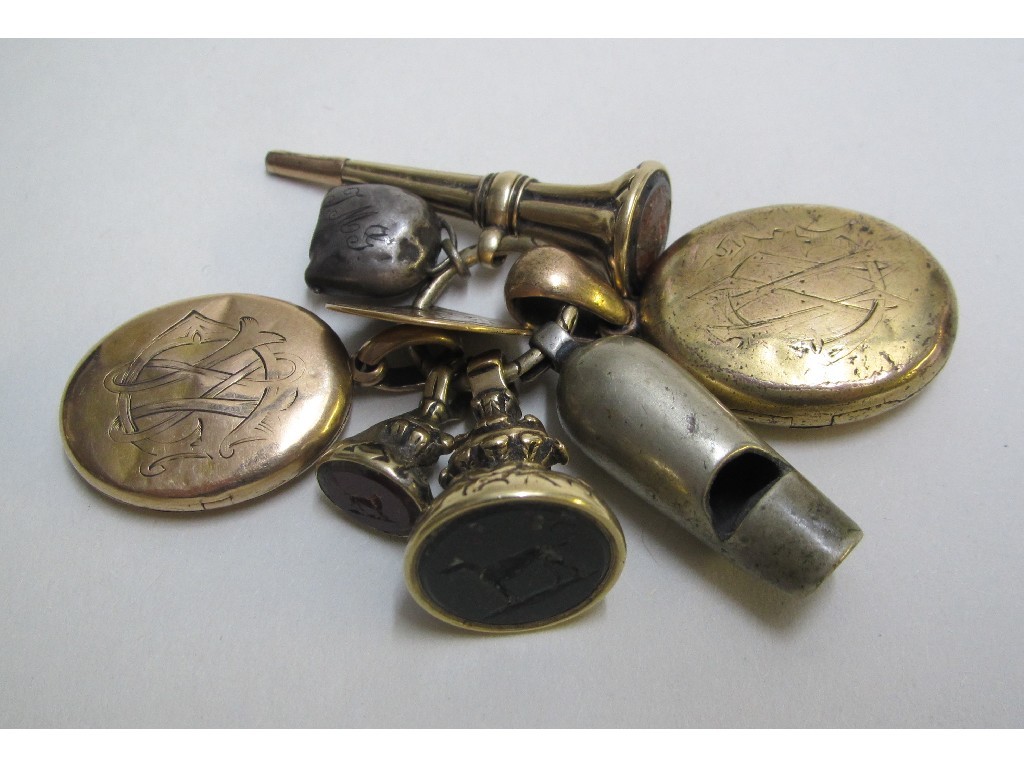 Appraisal: Victorian gilt metal charms comprising two lockets two seals bell