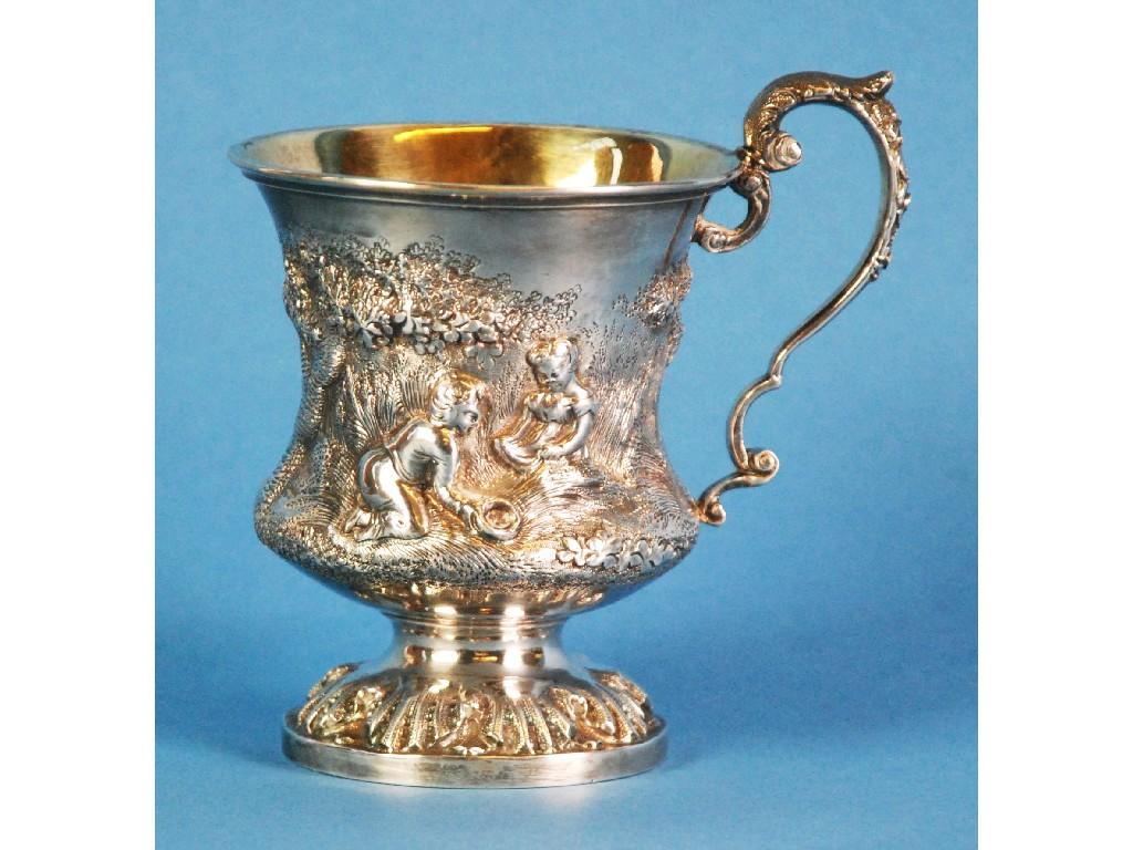 Appraisal: WILLIAM IV EMBOSSED SILVER PEDESTAL MUG waisted form with gilt