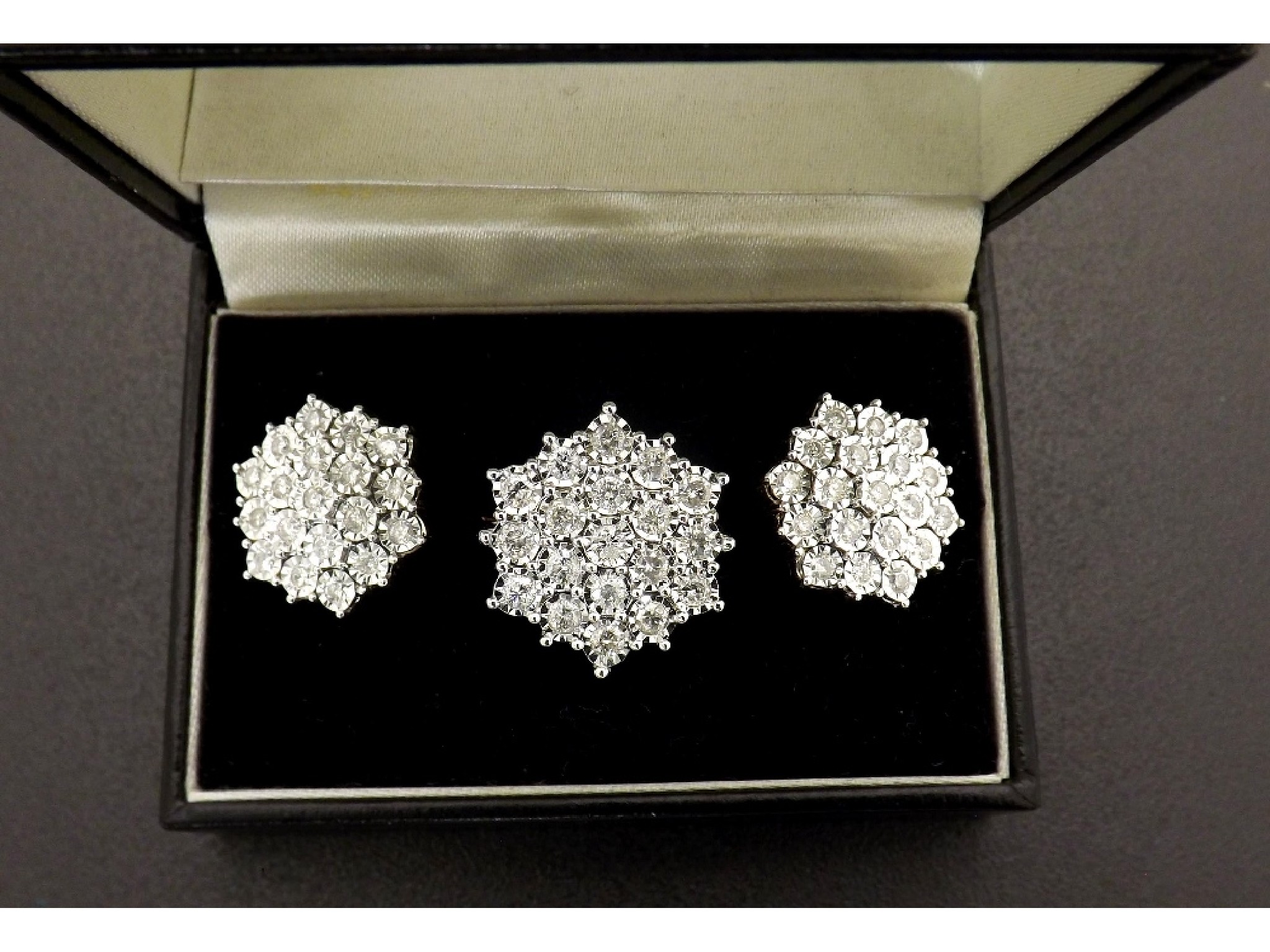 Appraisal: Impressive diamond cluster ring and matching earrings round brilliant-cuts ct