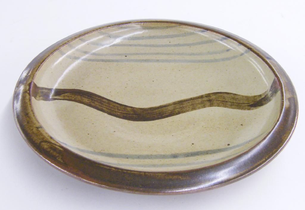 Appraisal: St Ives studio circular stoneware glaze dish impressed seal mark